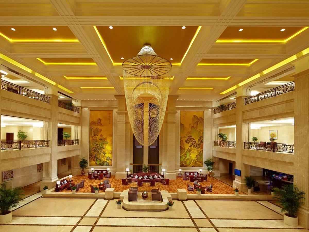 Jurong Yukun New Century Hotel Jiangsu Номер фото
