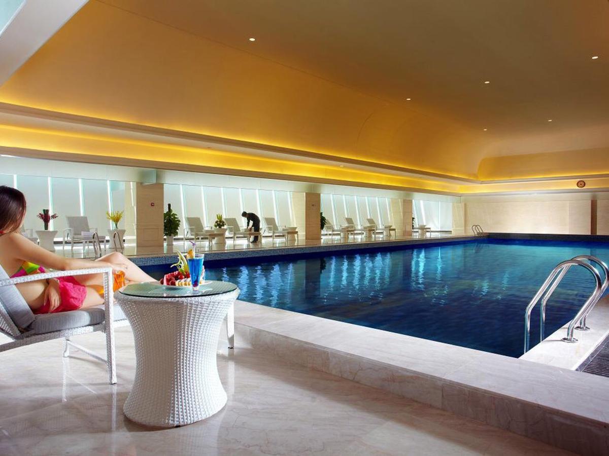 Jurong Yukun New Century Hotel Jiangsu Номер фото