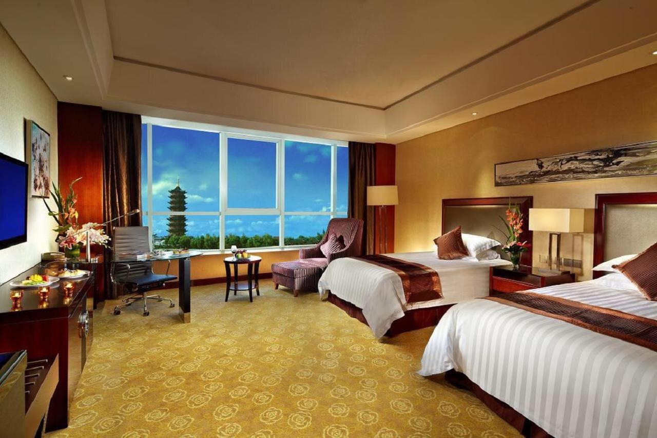 Jurong Yukun New Century Hotel Jiangsu Номер фото