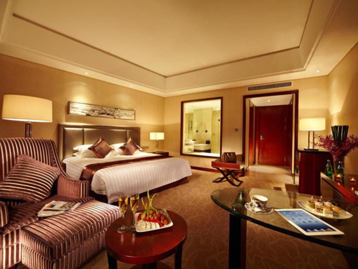 Jurong Yukun New Century Hotel Jiangsu Номер фото