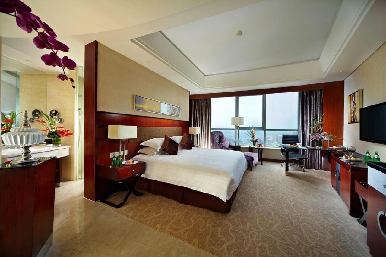 Jurong Yukun New Century Hotel Jiangsu Номер фото