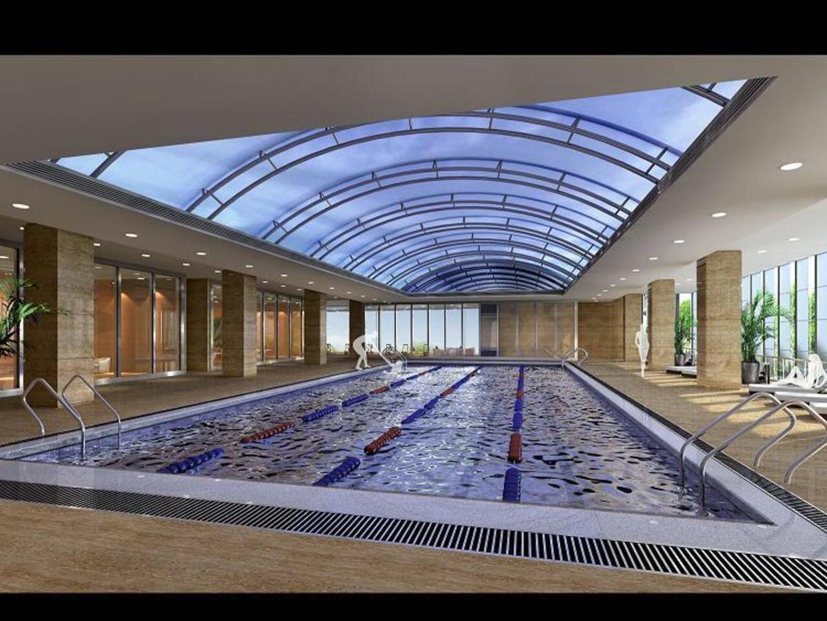 Jurong Yukun New Century Hotel Jiangsu Номер фото